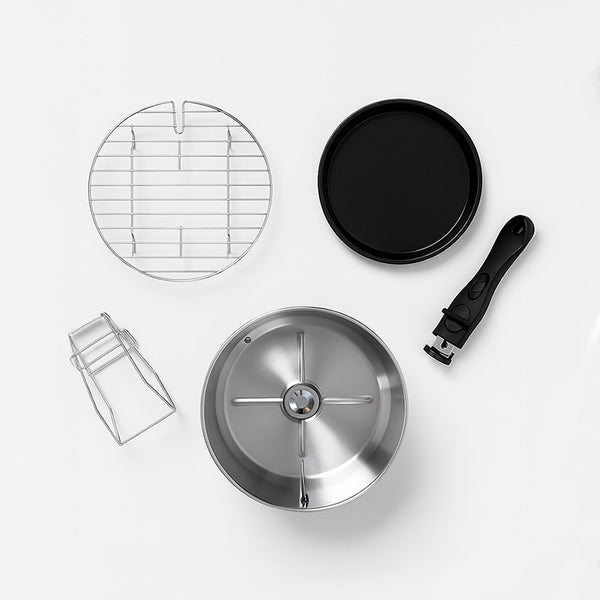 Kleva Rotating Crisp Air Fryer accessories laid out, including a grill rack, baking tray,  pot, and detachable handle.