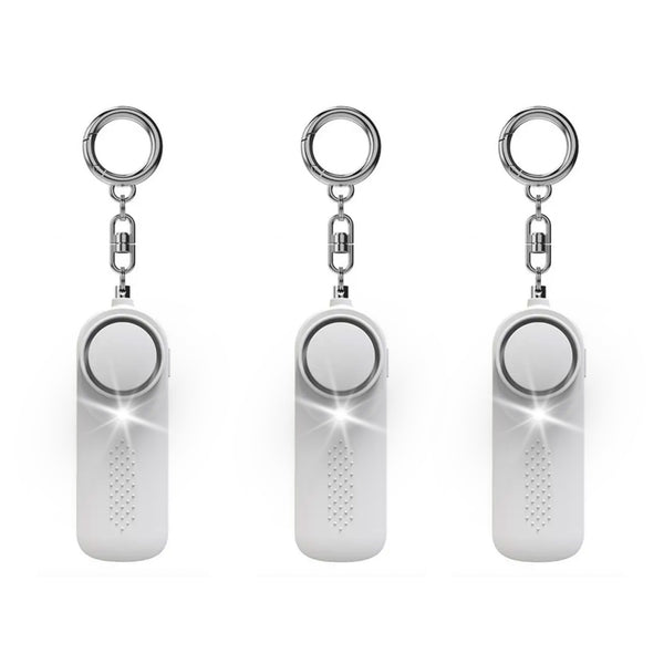 Three Pack white personal safety alarms with LED flashlights activated