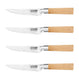 The Kleva Range KlevaCut® Master Series 4 Piece Bamboo Steak Knives Set features four precision-serrated steak knives with silver blades and light bamboo handles, arranged parallel on a white background for a premium look.