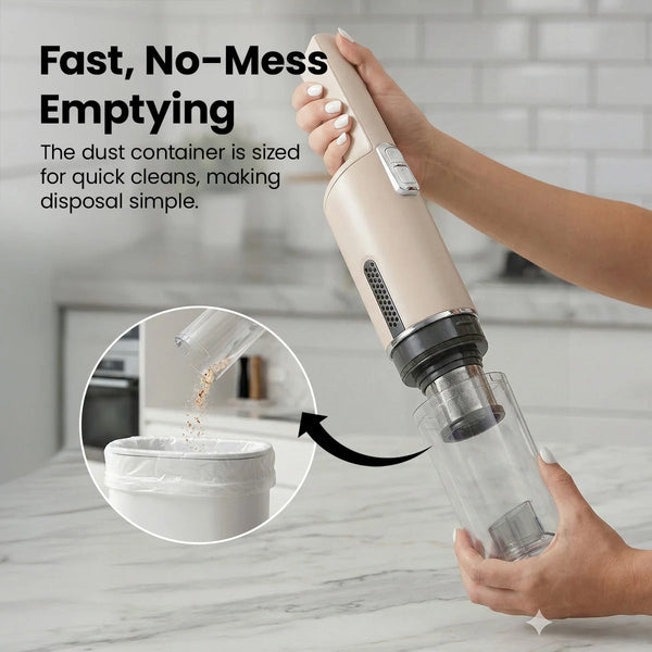 Cordless handheld vacuum dust container being removed and emptied into a trash bin
