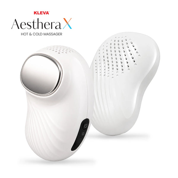 The KLEVA® AestheraX Hot & Cold Therapy Massager by Kleva Range features a smooth metal surface, ridged ergonomic design, visible power button and vent holes—ideal for facial depuffing and massage in your skincare routine.