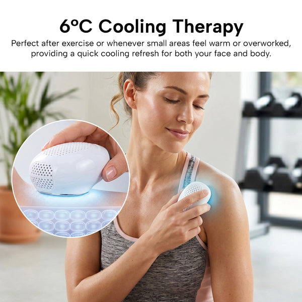 A woman uses the KLEVA® AestheraX Hot & Cold Therapy Massager by Kleva Range on her shoulder. The small, white device emits a blue light and delivers 6°C cooling therapy for targeted relief after exercise, with gym equipment in the background.