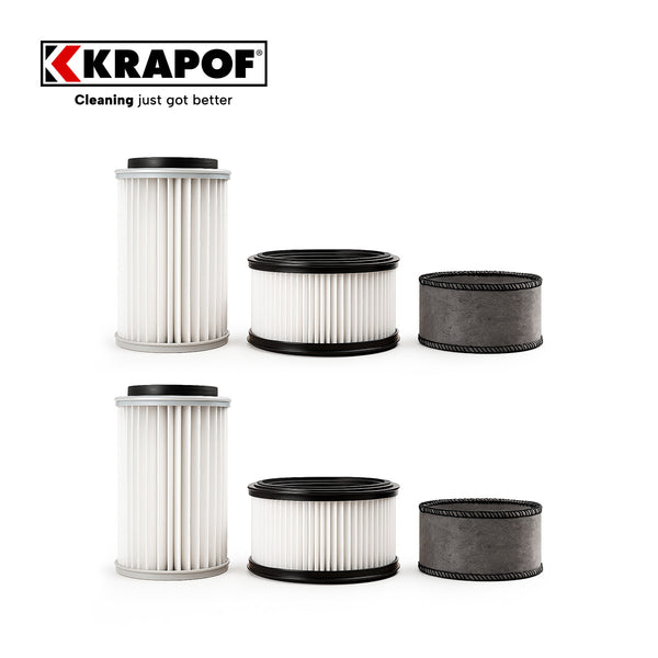 Six cylindrical filters from the Kleva Range 6 Pack Filter Kit for KRAPOF® Auto Clean Self Empty Vac, three clean and three dirty, are arranged in two rows on a white background. The KRAPOF logo and "Cleaning just got better" appear at top left.