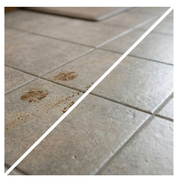 Tile floor with brown stains on a white background