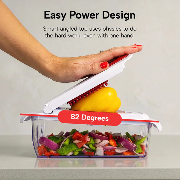 A hand pressing down on a white vegetable chopper to slice a yellow bell pepper