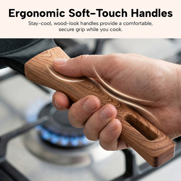 Ergonomic soft-touch wooden handle on non-stick frying pan for comfortable grip