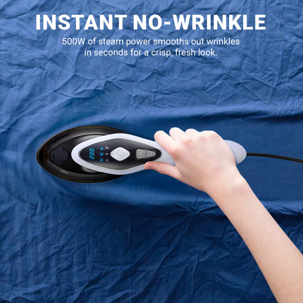 A hand uses the Kleva® 2-in-1 SteamPress Handheld 1500W Clothes Steamer & Garment Iron from Kleva Range to smooth wrinkles from blue fabric. Text: INSTANT NO-WRINKLE: 1500W steam power delivers crisp, fresh results in seconds.