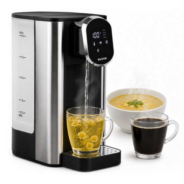 The KLEVA® Instant Hot Water Dispenser Deluxe XXL by Kleva Range, featuring a 4L water tank and a digital screen with custom temperature control, pours hot water into a glass mug filled with chamomile flowers; next to it are a glass of coffee and a steaming bowl of soup.