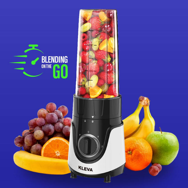 The Kleva Range Health Hurricane GO™ Personal Blender (700ml) stands upright with fruit inside, surrounded by grapes, bananas, an apple, and orange. A blue background reads “Blending on the Go” beside a green stopwatch—perfect for smoothies anywhere.