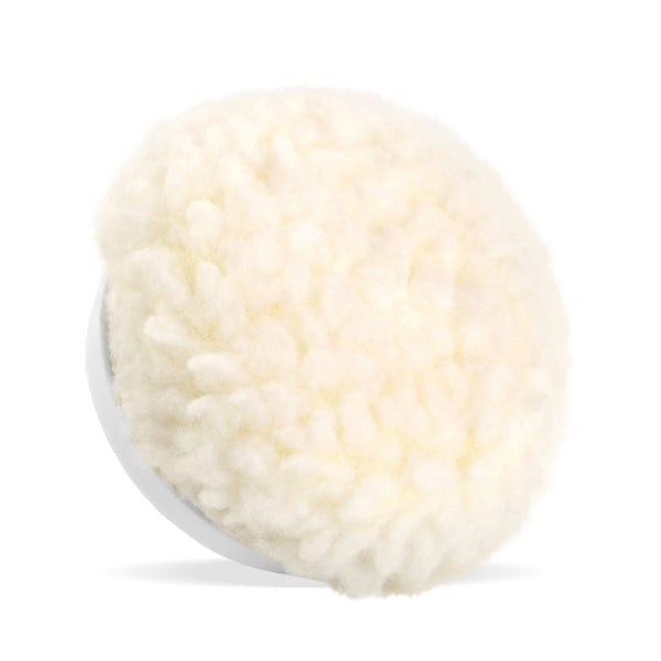 A round, white wool pad with a domed surface for your Kleva Range Make Old Shoes Look New! Kleva Clean Sneaks Automatic Shoe Cleaner, shown on a plain white background.