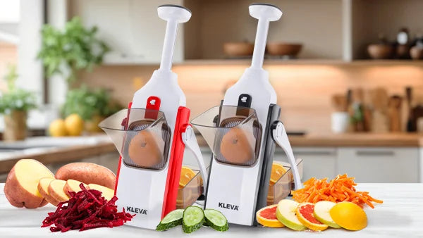 Kleva Safety Slicer in red and black colors showing vertical plunger action for safe vegetable slicing of potatoes, cucumbers, and beetroot.