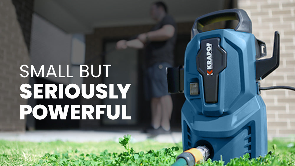 Compact high-power portable pressure washer in use.