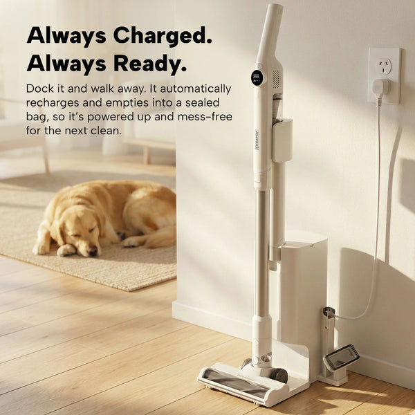Krapof self-empty cordless vacuum docked and charging beside wall outlet