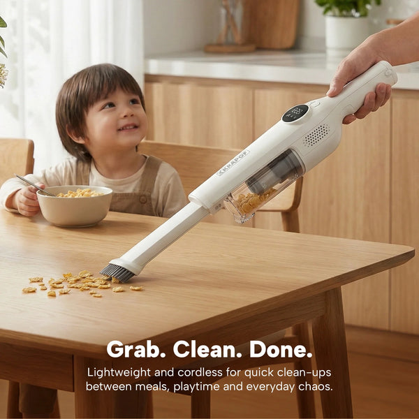 Lightweight handheld vacuum cleaning cereal crumbs from dining table