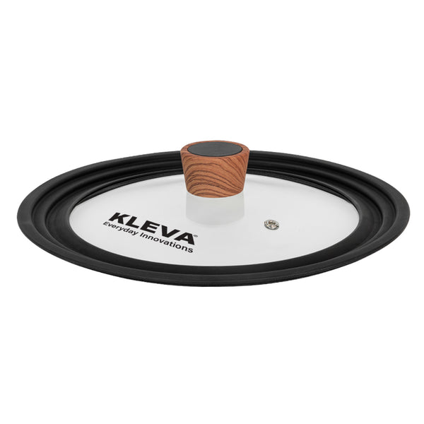 The Kleva Range Diamond Earth® Universal Glass Lid 24-28cm features a black rim, wood-patterned handle, steam vent, and fits 24-28cm pots. The lid displays the KLEVA Everyday Innovations logo and is made from durable universal silicone and glass.