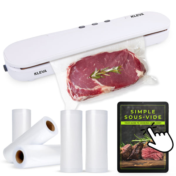 The Kleva Range Kleva® Vac Seal & Save Food Saver Vacuum Sealer seals steak and rosemary in a bag, while three free sealer bag rolls and a sous-vide guide help keep your food fresh for your next meal.