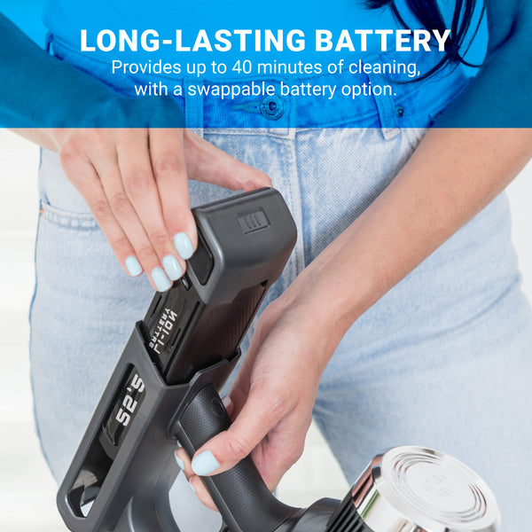 A person inserts the Power Pack Battery For KRAPOF® Wet & Dry 2-in-1 Vacuum by Kleva Range into a handheld vacuum. Blue text above reads, "LONG-LASTING BATTERY: Up to 40 minutes' cleaning time, plus swappable battery option.
