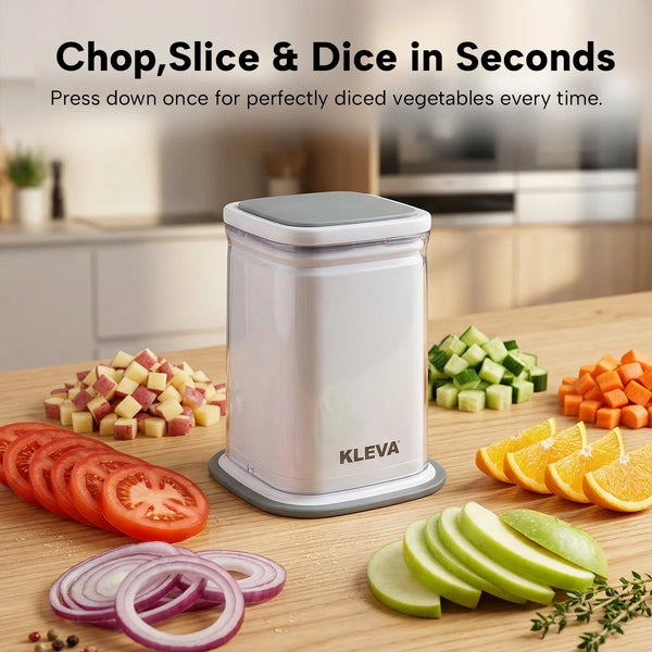 Kleva ChipChop vegetable chopper chopping tomatoes, onions, cucumbers and apples on kitchen counter
