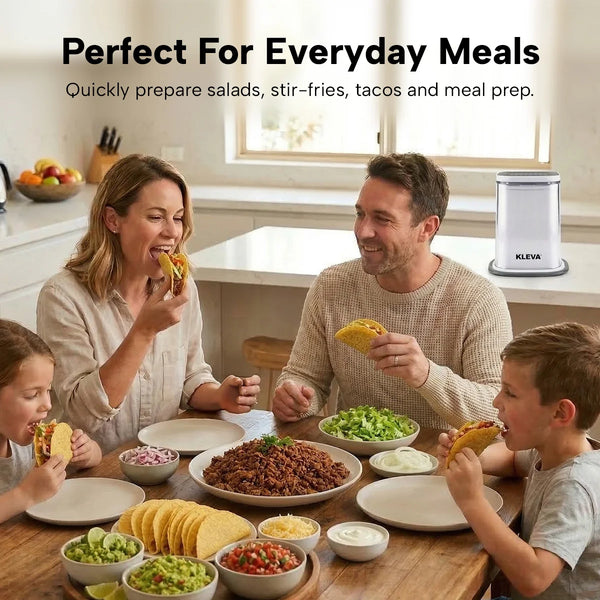 Family enjoying tacos at dinner table with fresh vegetables prepared using Kleva ChipChop vegetable chopper
