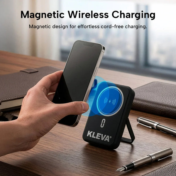 Kleva magnetic wireless charging pad with a phone on a desk