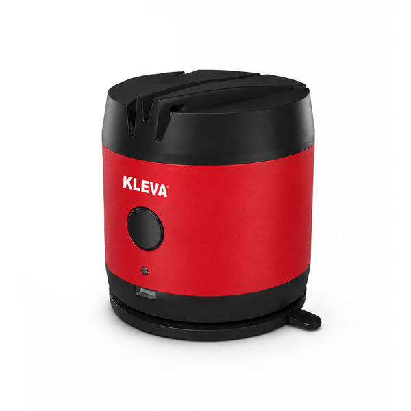 The KLEVA® ElectraSharp Knife Sharpener by Kleva Range is a red and black electric sharpener featuring sharpening slots on top and a front power button, designed to restore dull knives and scissors to razor-sharp results in seconds.