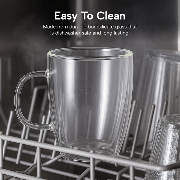 Empty double-wall glass cup inside dishwasher.