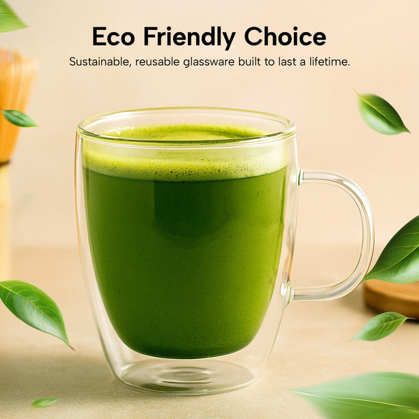 Double-wall glass cup filled with green matcha.