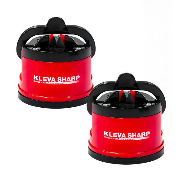 Two red Kleva Range Kleva Sharp® The Original World's Best Knife Sharpeners with black handles and sharpening slots are side by side on a white background. Each features tungsten carbide technology and is labeled "Kleva Sharp Worlds Best Knife Sharpener.