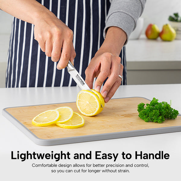 Lightweight kitchen knife slicing lemon with ergonomic handle for precise control and comfort