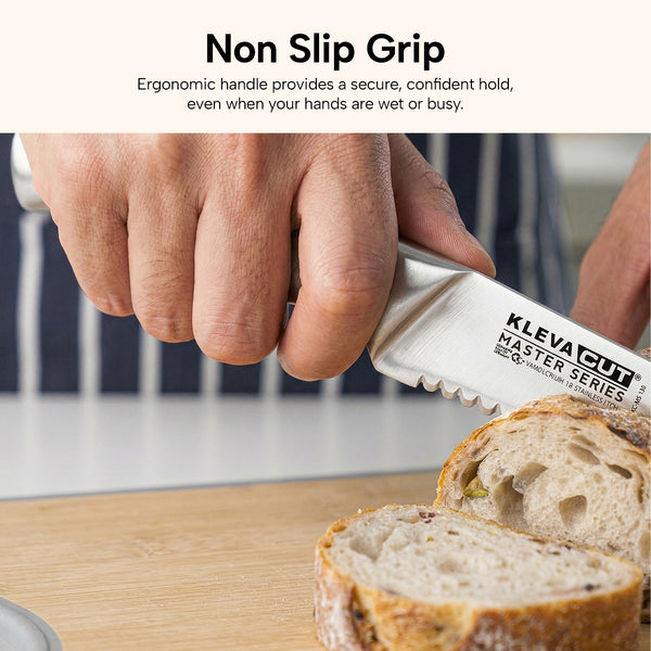 Ergonomic non-slip kitchen knife handle providing secure grip while slicing fresh bread
