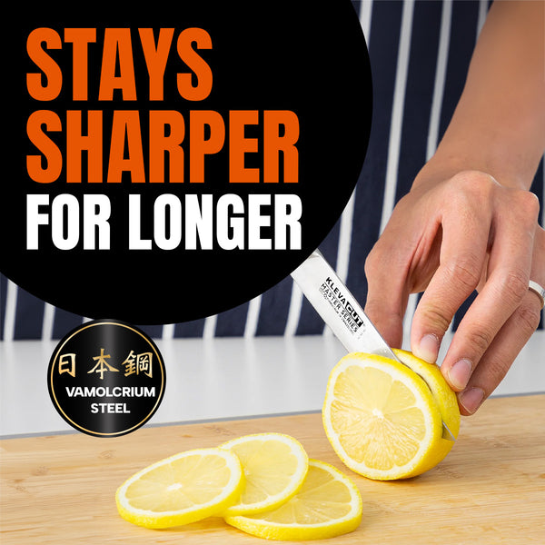 A hand slices a lemon on a wooden board using a knife from the KlevaCut® Master Series 4pc Knife Set by Kleva Range, featuring premium Japanese steel. Text above reads STAYS SHARPER FOR LONGER, while a black circle logo with Japanese characters highlights the authenticity of its Vamolcrium steel construction. The set includes a bamboo storage case and free gifts.