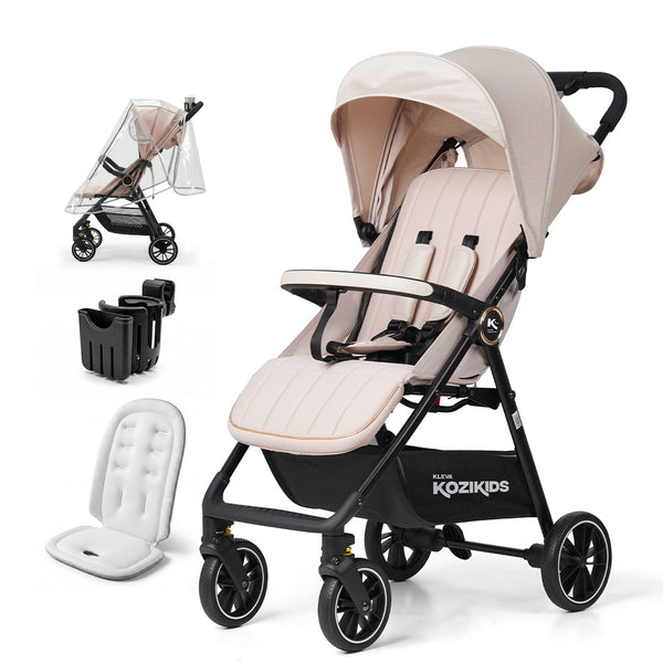 The Kleva Range KLEVA® KoziKids Compact & Lightweight Travel Stroller (beige/black) includes a canopy, rain cover, seat liner, black adapters, four wheels, and an under-seat basket—ideal for families on the move. Suitable from 6 months to toddler.