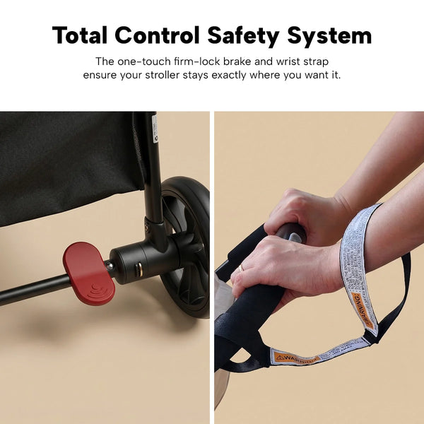 A close-up shows the red foot brake on the KLEVA® KoziKids Compact & Lightweight Travel Stroller by Kleva Range, with a hand wearing a safety wrist strap—highlighting key safety features for babies 6 months to toddler.