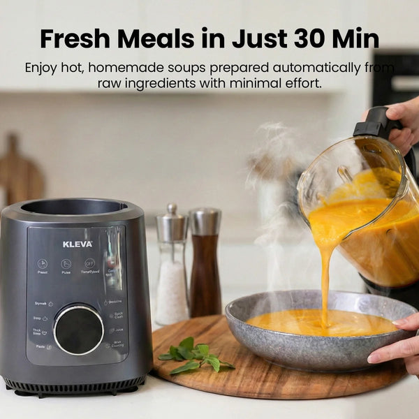 Pouring fresh, steaming hot soup from a Kleva Mealio soup maker blender into a bowl, showcasing the 30-minute cook time.