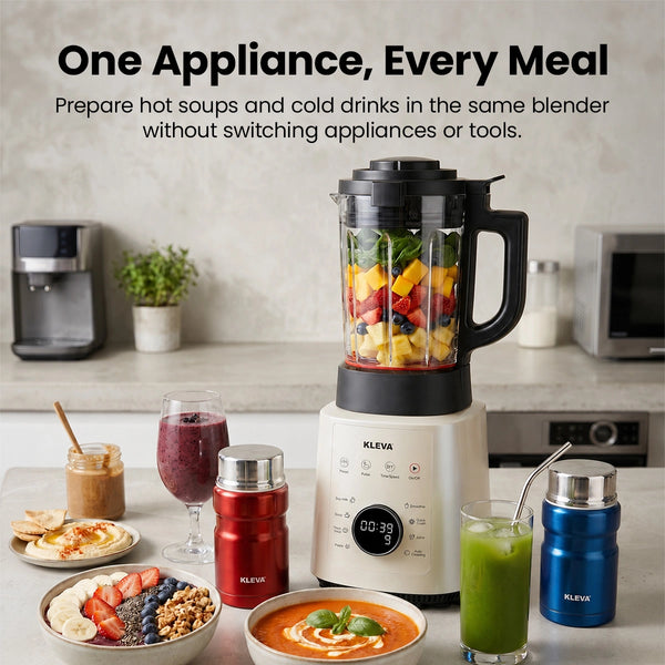 The Kleva Range Mealio® Hot & Cold Blender sits on a kitchen counter with two FREE soup flasks, bowls of food, a smoothie, and a green drink—showcasing its versatility for soups, meals, and smoothies. Recipe E-Book included.