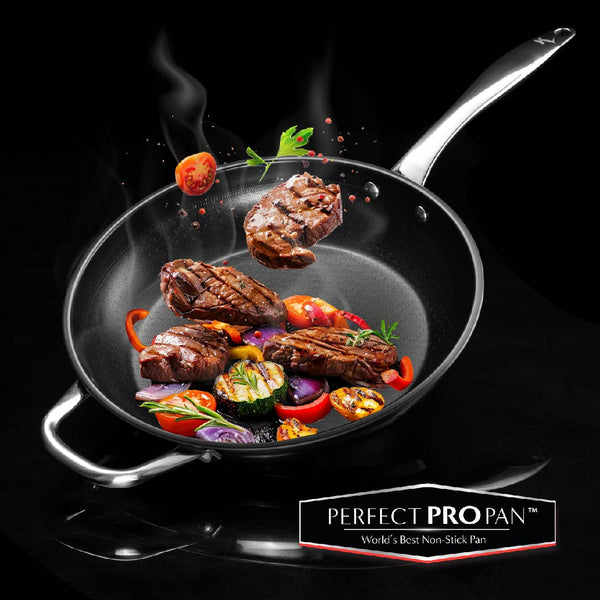 A frying pan with a non-stick surface featuring a stainless steel handle. Food is being cooked in the pan, and it has text stating 'PERFECT PRO PAN - World’s Best Non-Stick Pan'.