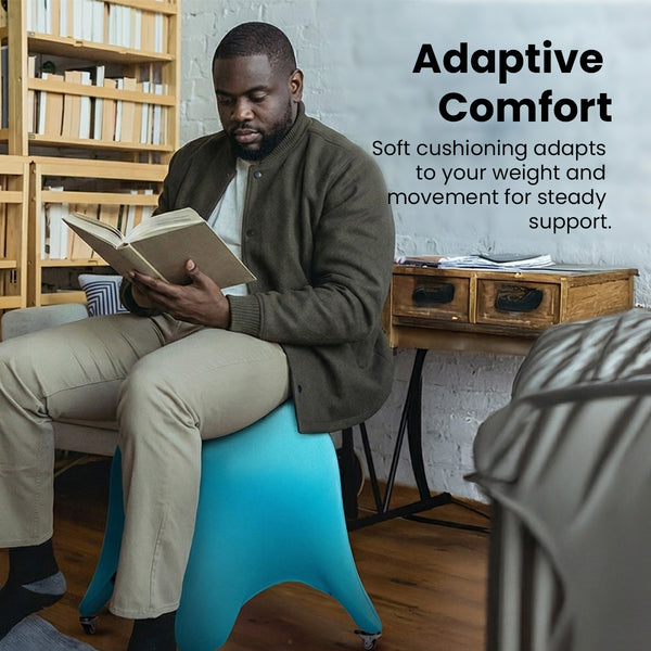 A man sits on a KLEVA® Posture Chair by Kleva Range, reading in his living room. Text beside him reads, “Adaptive Comfort: Soft cushioning adapts to your weight and movement for steady support.”.