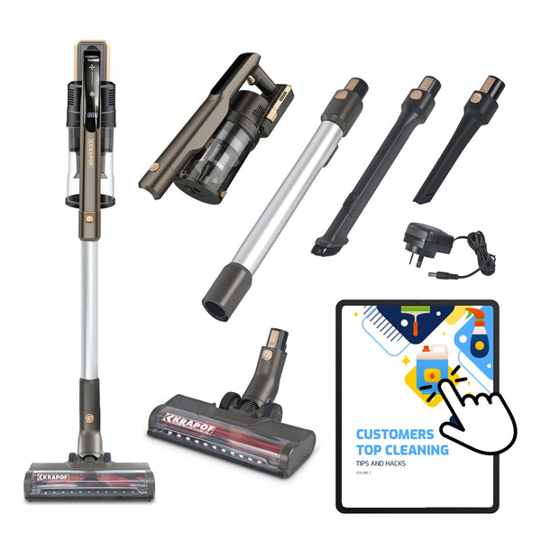 The KRAPOF® Power Vac S3 Cordless Stick Vacuum by Kleva Range comes with a crevice tool, brush, power adapter, extension tube, and an extra FREE second battery. A digital booklet "Customers Top Cleaning Tips and Hacks" is shown on a tablet.