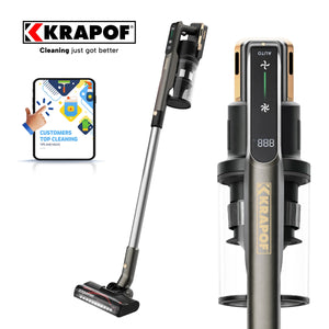 The KRAPOF® Power Vac S3 Cordless Stick Vacuum by Kleva Range stands upright, showcasing its handle and controls, while a hand points at a tablet displaying customer satisfaction and cleaning graphics. Includes an extra FREE second battery.