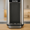 Kleva instant hot water dispenser pouring steaming hot water into glass mug for quick and convenient drinks