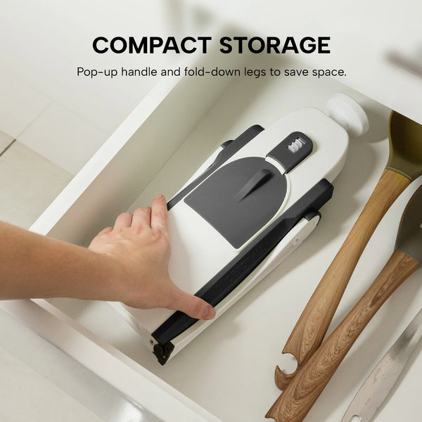 Folded Kleva Safety Slicer XL stored neatly inside kitchen drawer