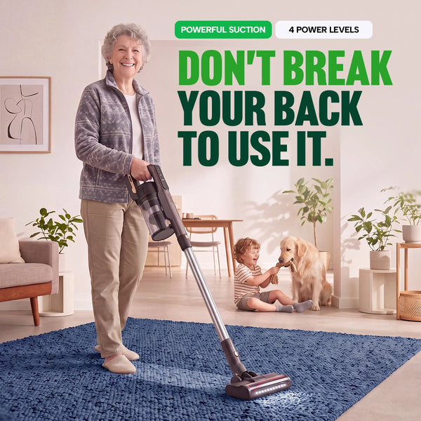 An older woman vacuums a blue rug in the living room with the KRAPOF® Power Vac S3 Cordless Stick Vacuum from Kleva Range, easily maneuvering thanks to its ultra-lightweight design. In the background, a child plays with a golden retriever as pet hair is effortlessly tackled using powerful suction and 4 adjustable power levels. Text: Don’t break your back to use it. Comes with an extra FREE second battery!.