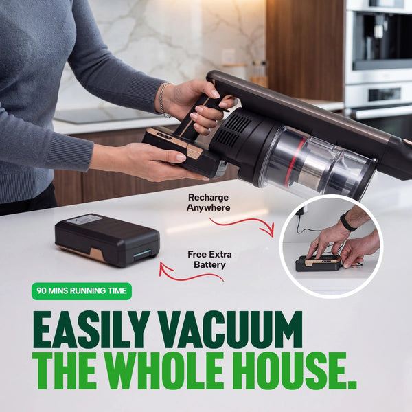 A person inserts a battery into the KRAPOF® Power Vac S3 Cordless Stick Vacuum by Kleva Range on a kitchen counter. An extra FREE second battery and charging instructions are shown. Text highlights a 90-minute run time, allowing you to vacuum the whole house with ultra-lightweight ease—making cleaning effortless from room to room, including pet hair removal.
