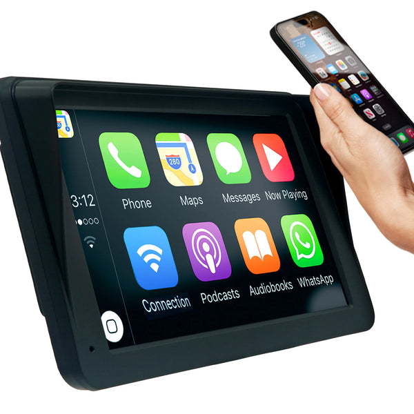 A hand holds a smartphone near the 7" HD Touch Portable Kleva SmartPlay by Kleva Range, displaying apps like Phone, Maps, Messages, and WhatsApp—highlighting wireless Apple CarPlay and Android Auto for universal car compatibility.
