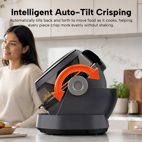 The Kleva® Spin Crisp IQ Rotating Digital Air Fryer by Kleva Range, in black and silver with a transparent lid, is shown tilting back and forth using 360° auto-rotate tech. Red arrows indicate motion as a woman stands nearby with food on the counter.