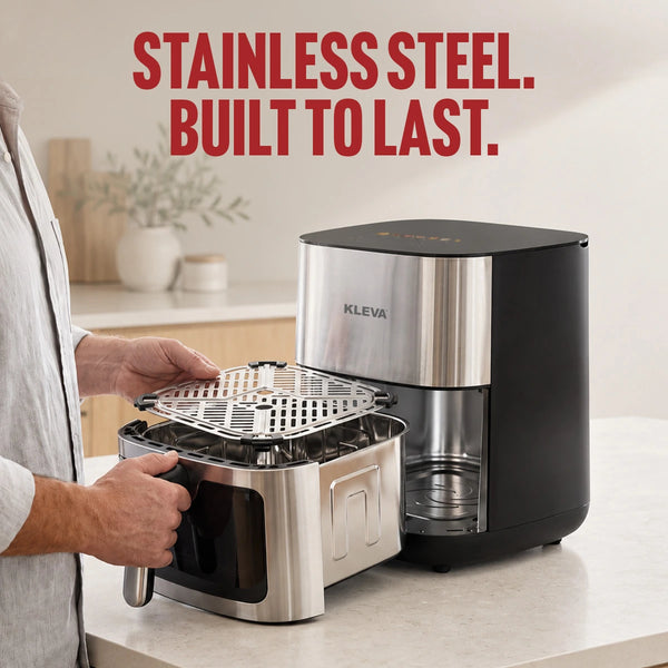 A KLEVA stainless steel and black countertop appliance shown in a kitchen setting, with a person's hands holding the front handle and large red text reading 'STAINLESS STEEL. BUILT TO LAST.