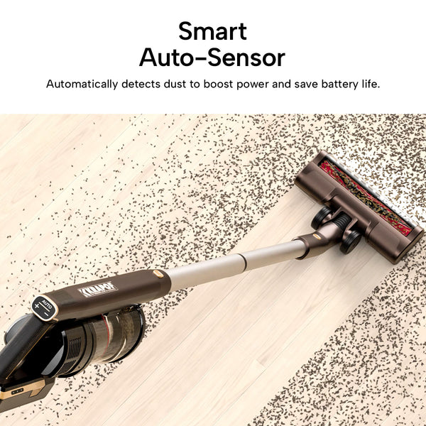 The KRAPOF® Super Slim Power Vac Cordless Stick Vacuum by Kleva Range is shown cleaning debris on a light wood floor, with smart auto-sensor technology that detects dust to boost power and save battery. Includes an extra free second battery.