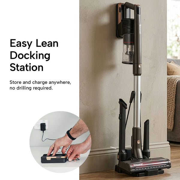 The KRAPOF® Super Slim Power Vac Cordless Stick Vacuum by Kleva Range is shown on a wall-mounted charging dock in a living room. An inset displays simple plug-in charging—no drilling required. Comes with an extra free second battery.