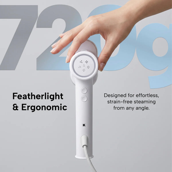 A hand holds the KLEVA® AirPress white garment steamer by Kleva Range with self-suction tech, shown against a light gray background. Text reads: Featherlight & Ergonomic—steams easily from any angle, no ironing board needed.