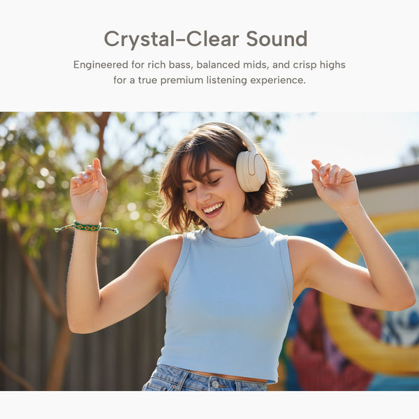 A young woman in a light blue sleeveless top smiles and dances outdoors wearing Kleva® AudioUltra Noise Cancelling Wireless Bluetooth Headphones by Kleva Range. Text above reads “Crystal-Clear Sound” and highlights their premium features.